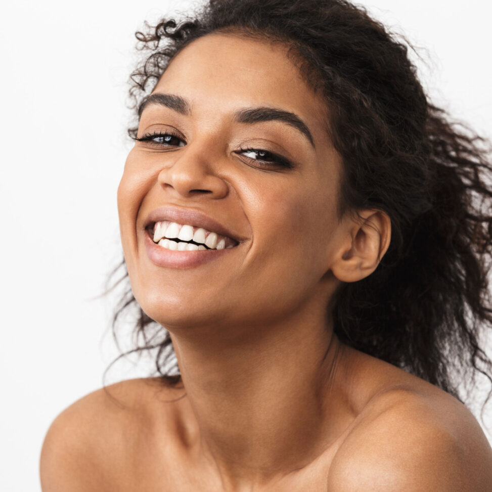 black women smiling at camera