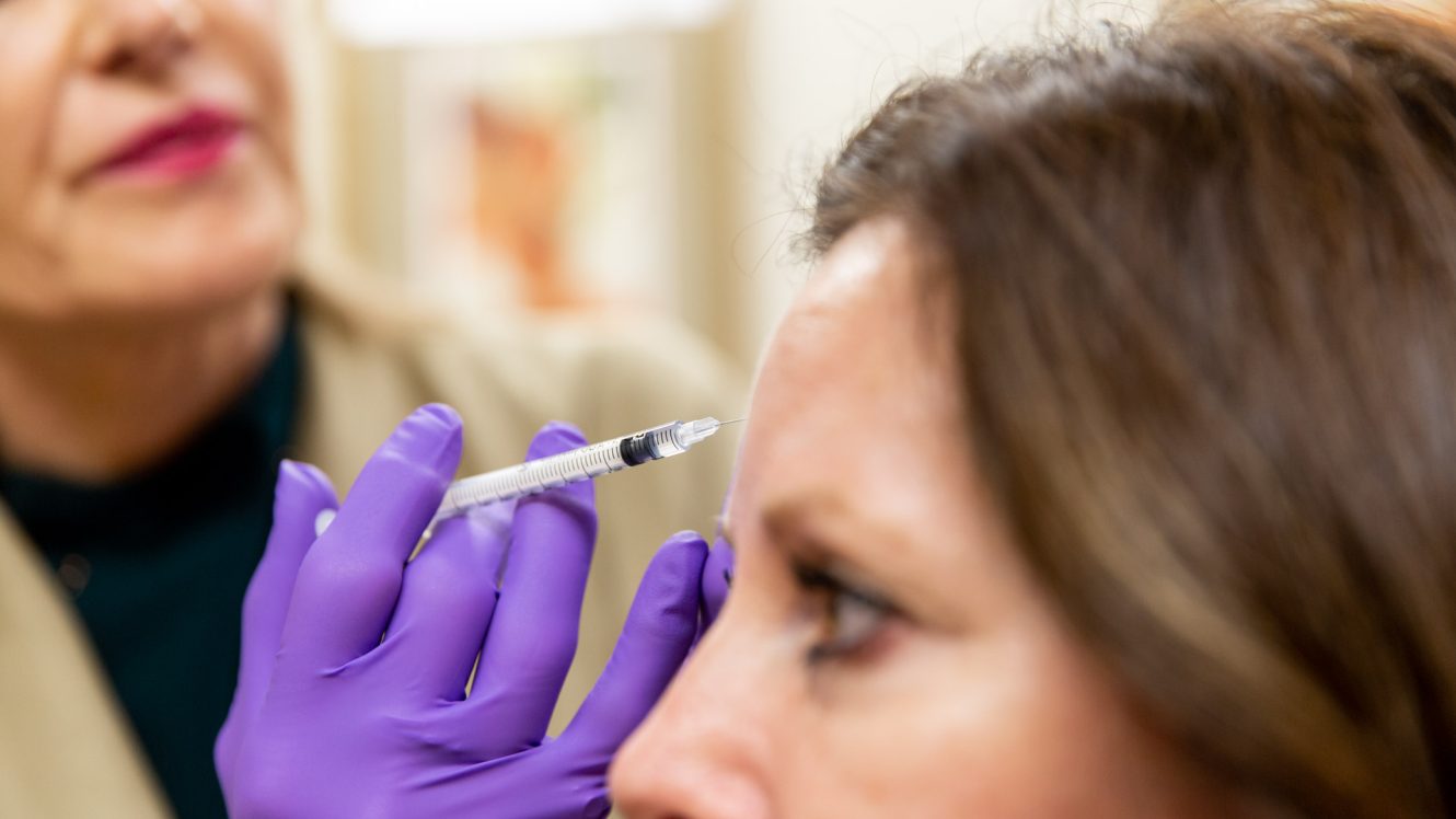 woman getting botox injection