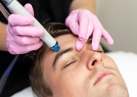 Woman receiving Hydrafacial treatment